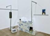 Lisa Kottkamp: Altering Borders and Moving Horizons, 2017, Installation, 300 bricks of porcelain, 
UV print on glass, metal profiles, 15 minutes sound loop, neon lights, paper, varying dimensions

